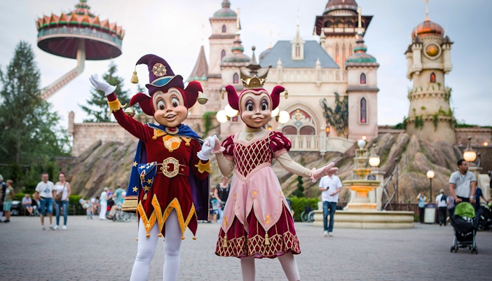 Characters in colorful costumes at Efteling theme park, Netherlands.