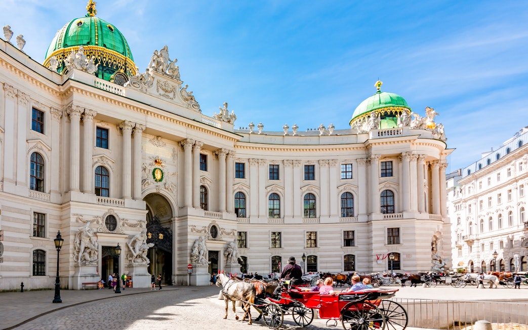 Horse-drawn carriage in front of Hofburg Palace, Vienna, near the Spanish Riding School.