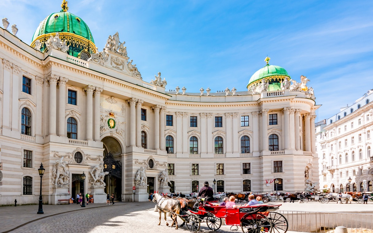 Horse-drawn carriage in front of Hofburg Palace, Vienna, near the Spanish Riding School.
