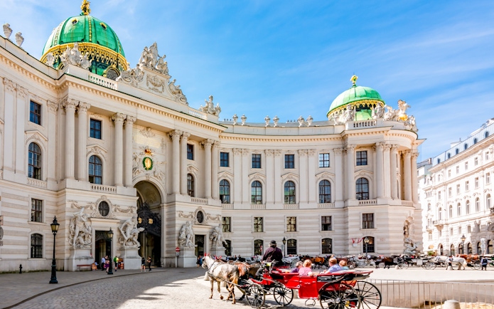 Horse-drawn carriage in front of Hofburg Palace, Vienna, near the Spanish Riding School.