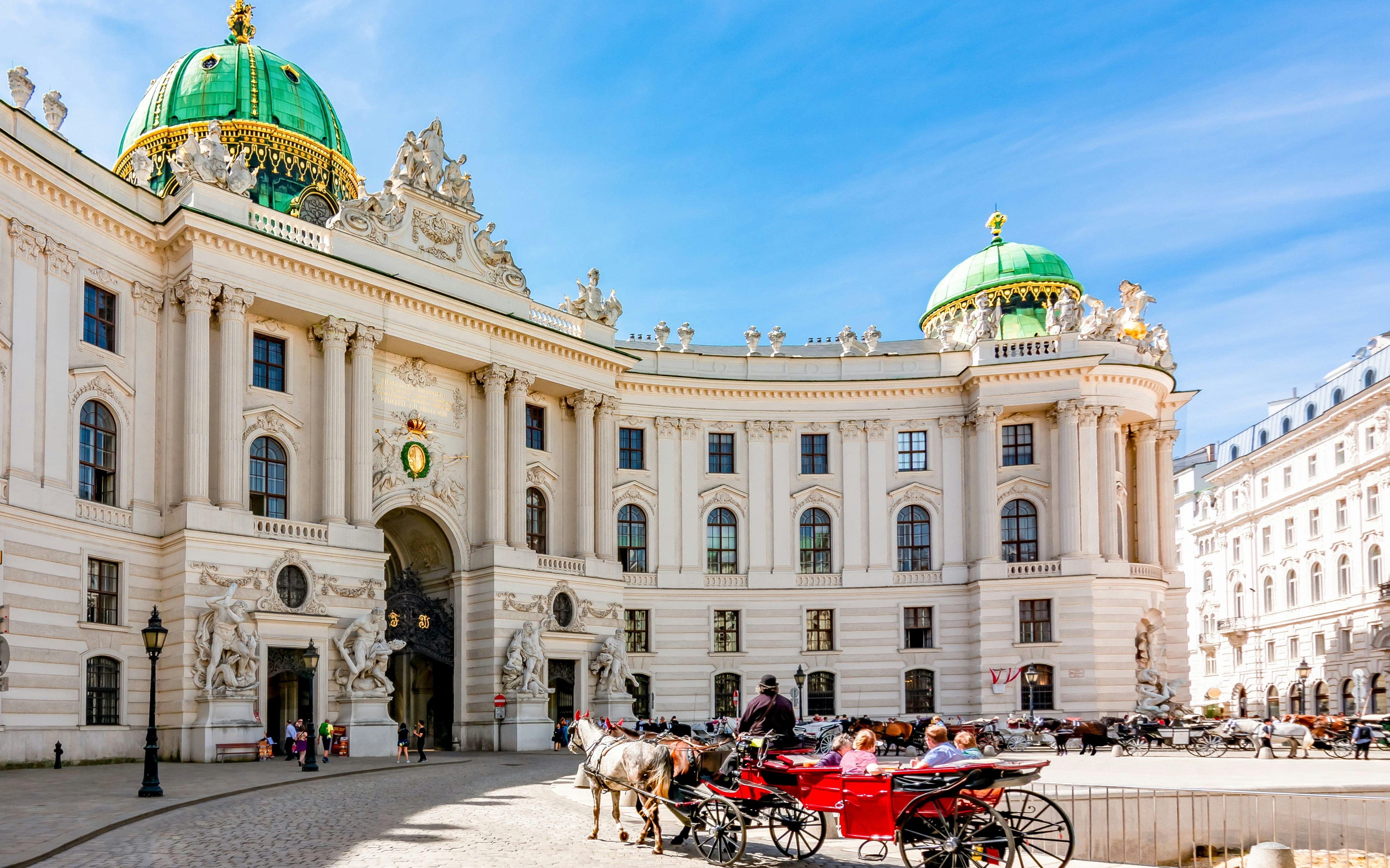 Horse-drawn carriage in front of Hofburg Palace, Vienna, near the Spanish Riding School.
