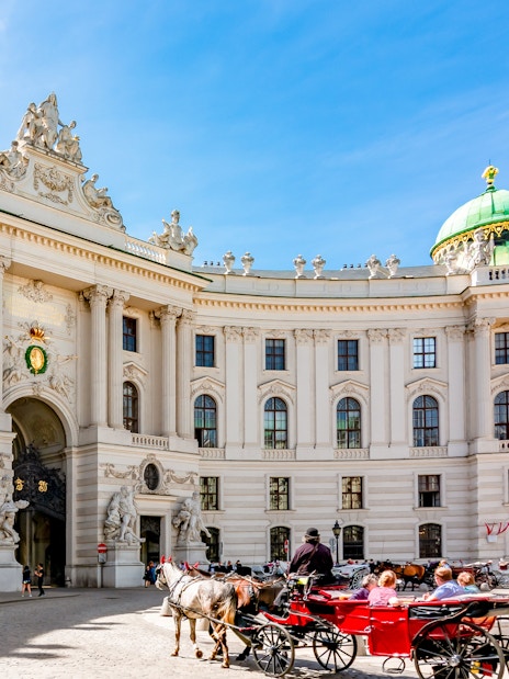 Horse-drawn carriage in front of Hofburg Palace, Vienna, near the Spanish Riding School.