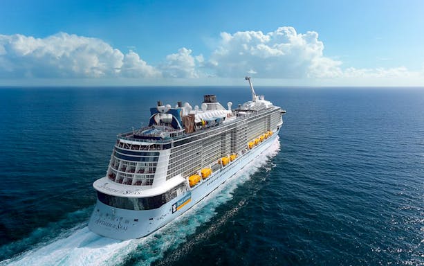 Cruise ship Anthem of the Seas sailing on open ocean for 3-night Penang cruise.