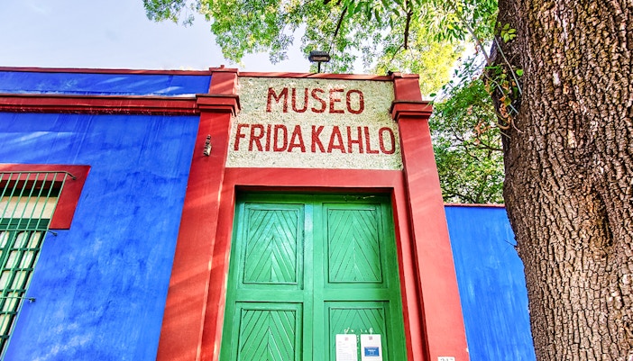 Frida Kahlo Museum entrance with vibrant blue walls in Mexico City.