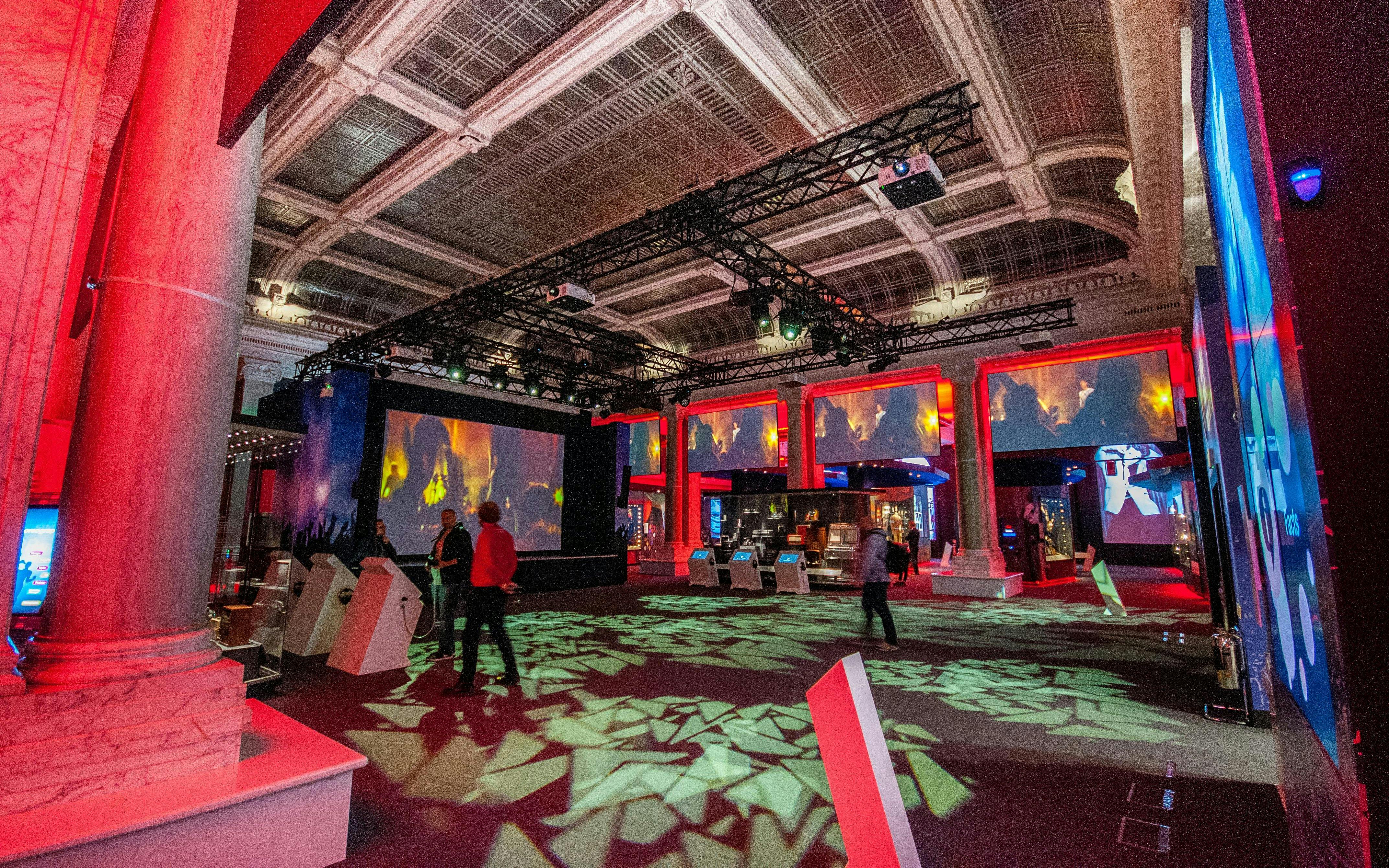 Interactive exhibit at The British Music Experience with colorful lighting and displays.