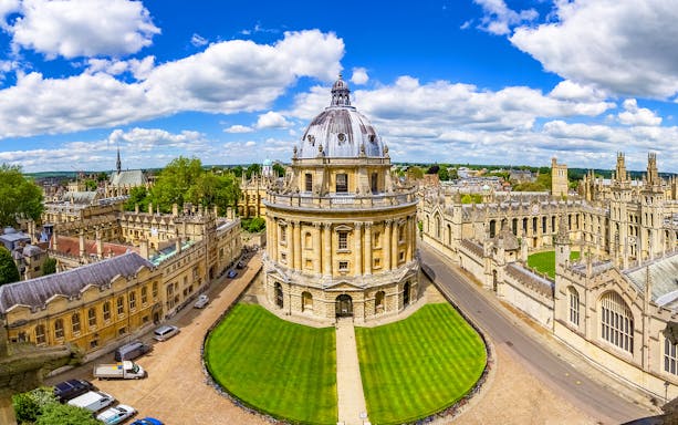 Aerial view of Radcliffe Camera at Bodleian Library, University of Oxford, surrounded by historic buildings.