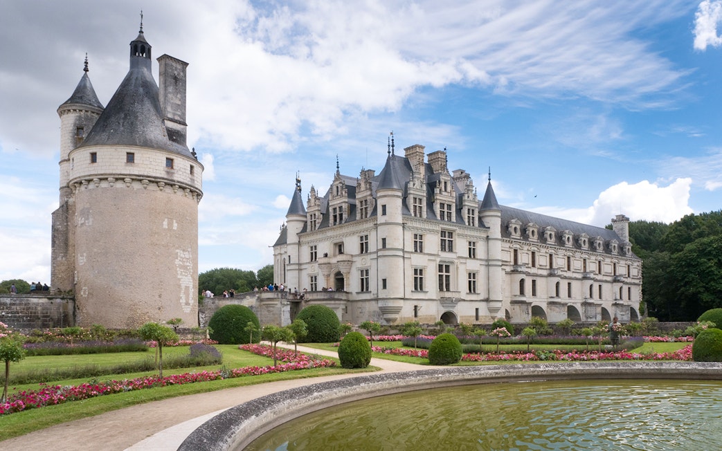 Chenonceau Castle with gardens and moat in Loire Valley, France.