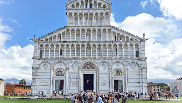 Visitors entering the Pisa Cathedral