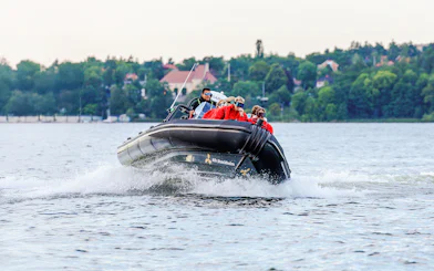 Passengers on a RIB speed boat tour in Stockholm waters.