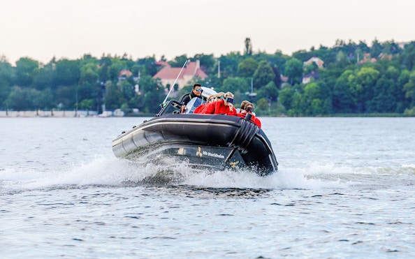 Passengers on a RIB speed boat tour in Stockholm waters.