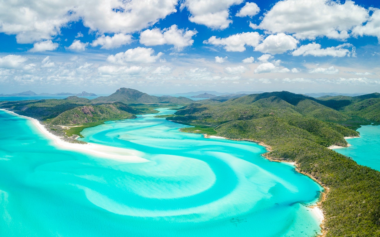 Aerial view of Hill Inlet's turquoise waters and white sands, Whitsundays, Australia.