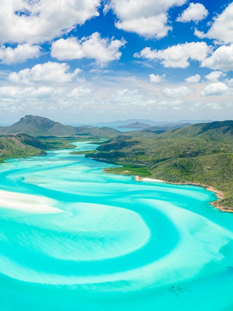 Aerial view of Hill Inlet's turquoise waters and white sands, Whitsundays, Australia.