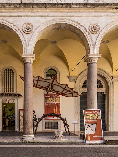 Leonardo da Vinci Museum entrance with flying machine exhibit in Rome.