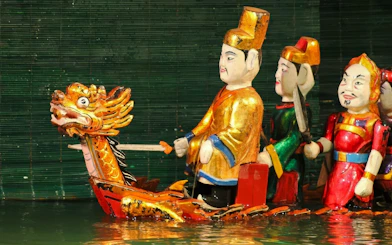 Puppets performing on water at Thang Long Water Puppet Show, Hanoi.