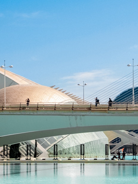 Tourists on bridge at Hemisfèric, City of Arts and Sciences, Valencia.