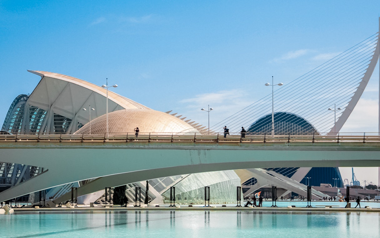 Tourists on bridge at Hemisfèric, City of Arts and Sciences, Valencia.