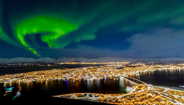 Northern lights (aurora borealis) above Tromso.