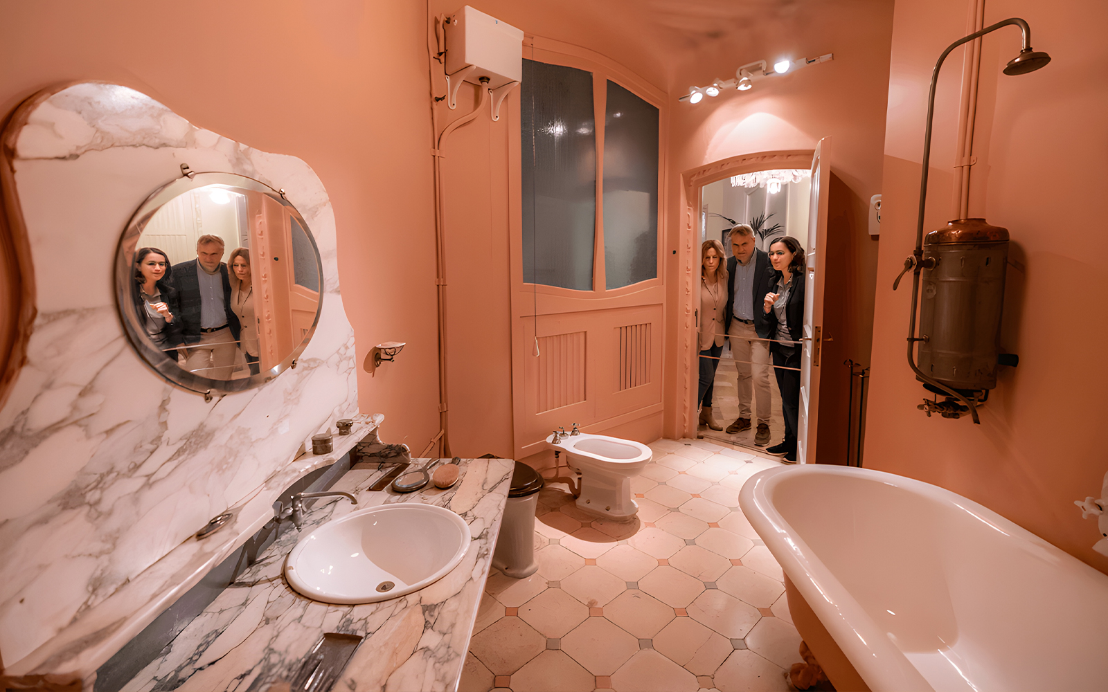 Washroom in La Padera's Tenants’ Apartment with marble sink and vintage fixtures.
