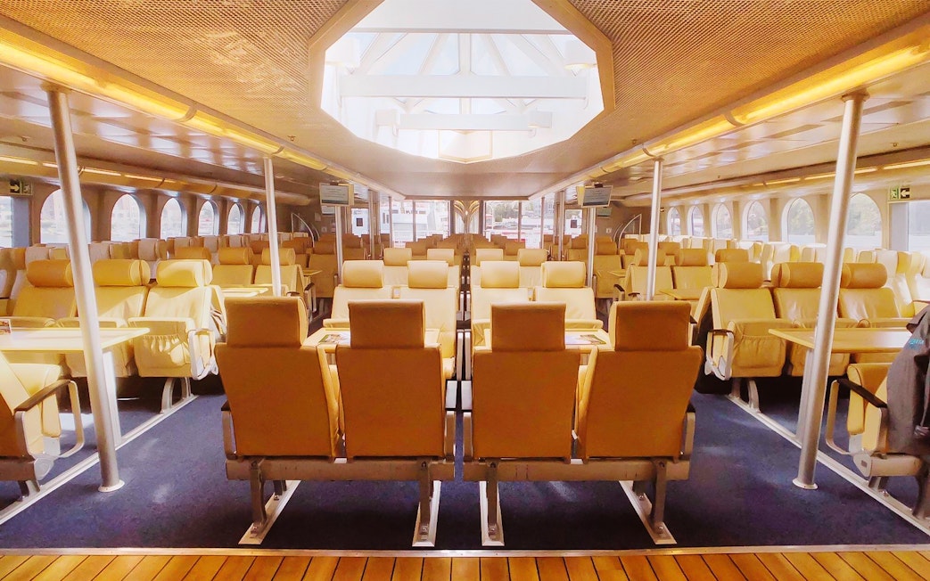 High-speed ferry interior with seating, Seattle to Victoria route.