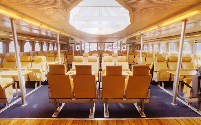 High-speed ferry interior with seating, Seattle to Victoria route.