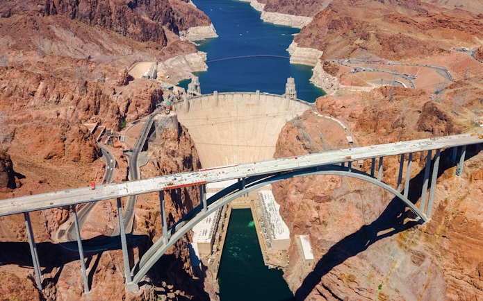 Aerial view of Hoover Dam and Colorado River Bridge in Nevada.