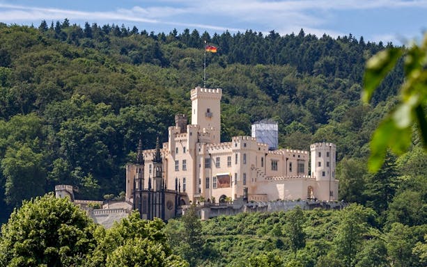 Stolzenfels Castle surrounded by lush greenery near Koblenz, Germany.