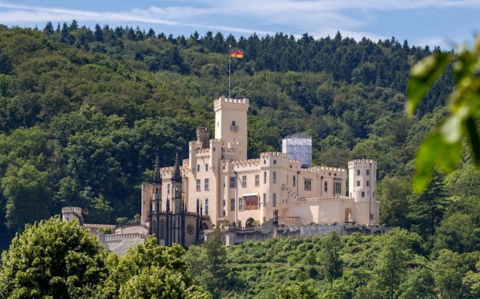 Stolzenfels Castle surrounded by lush greenery near Koblenz, Germany.
