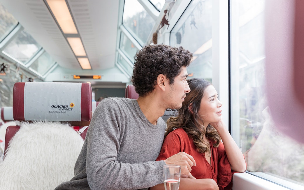 Passengers enjoying scenic views on the Glacier Express, Interrail Switzerland.