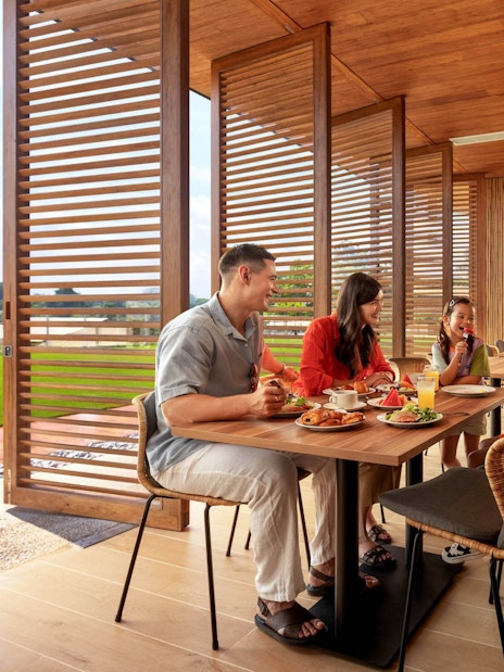 Family dining at Colugo Camp, Mandai Wildlife Reserve.