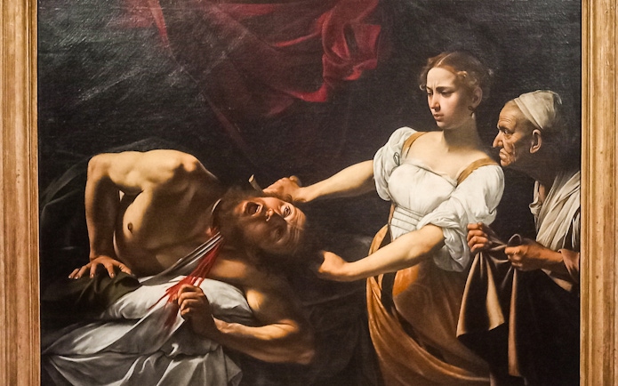 Judith Beheading Holofernes painting by Caravaggio, depicting dramatic biblical scene.