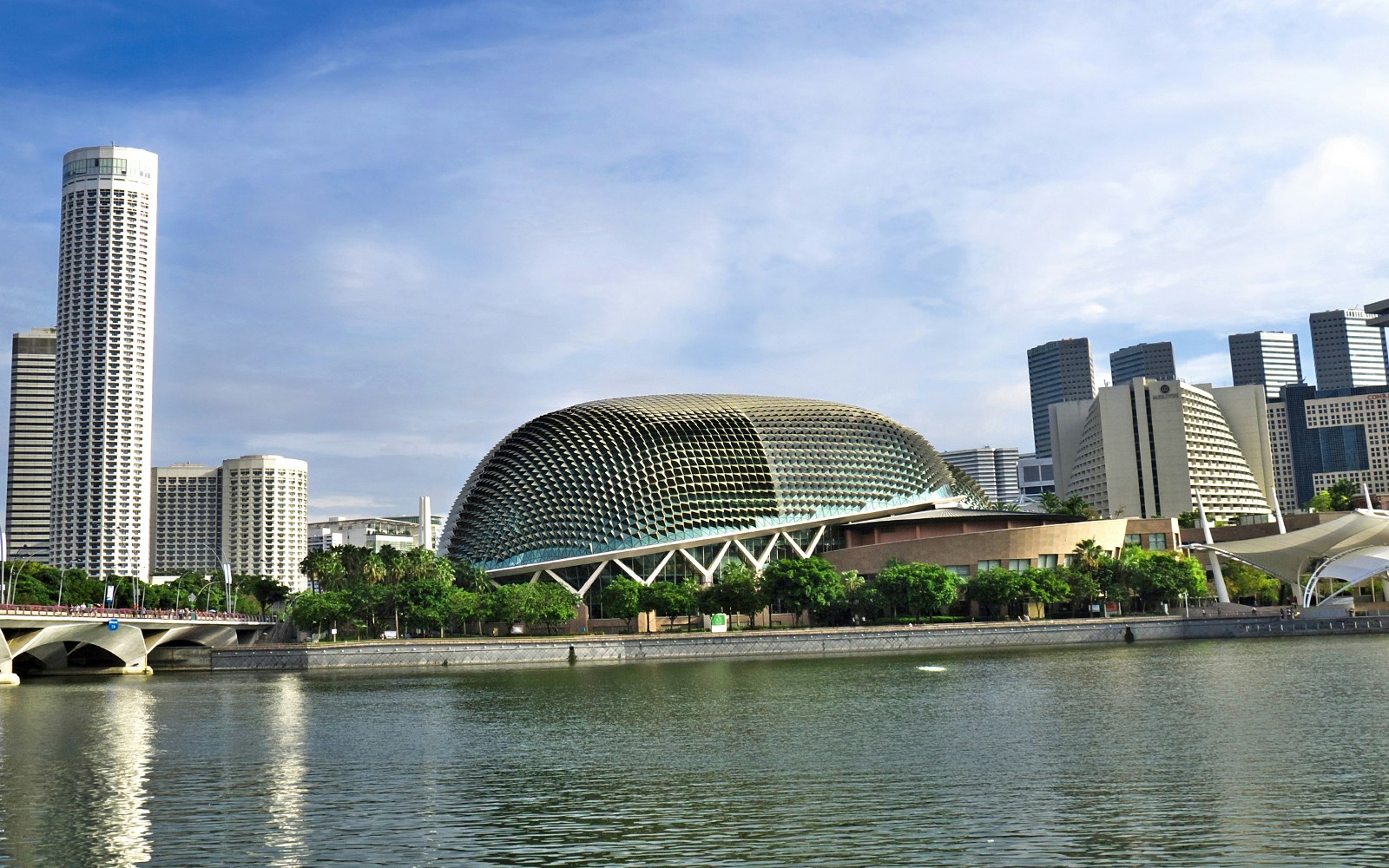 Esplanade Theatres on the Bay with Singapore city skyline in the background.
