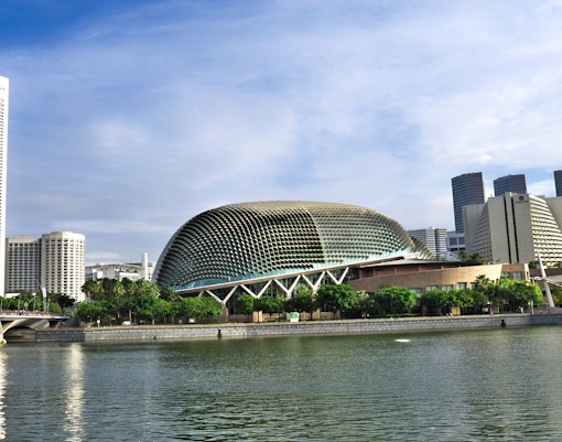 Esplanade Theatres on the Bay with Singapore skyline in the background.
