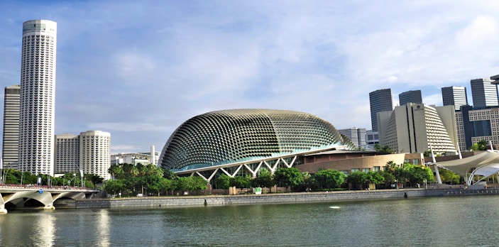 Esplanade Theatres on the Bay with Singapore skyline in the background.