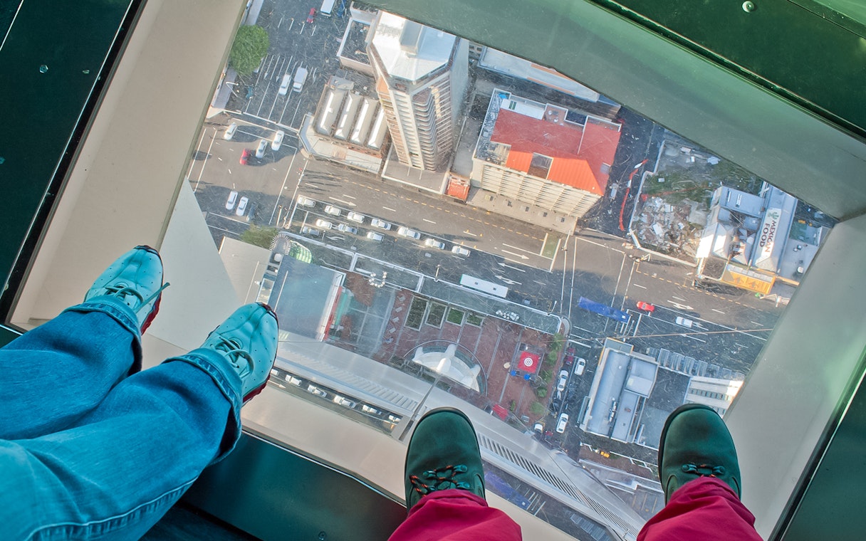 View from Skytower glass floor overlooking Auckland streets below.
