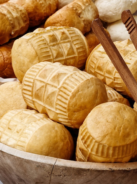 Traditional smoked cheese in wooden bowls, Zakopane day trip from Krakow.
