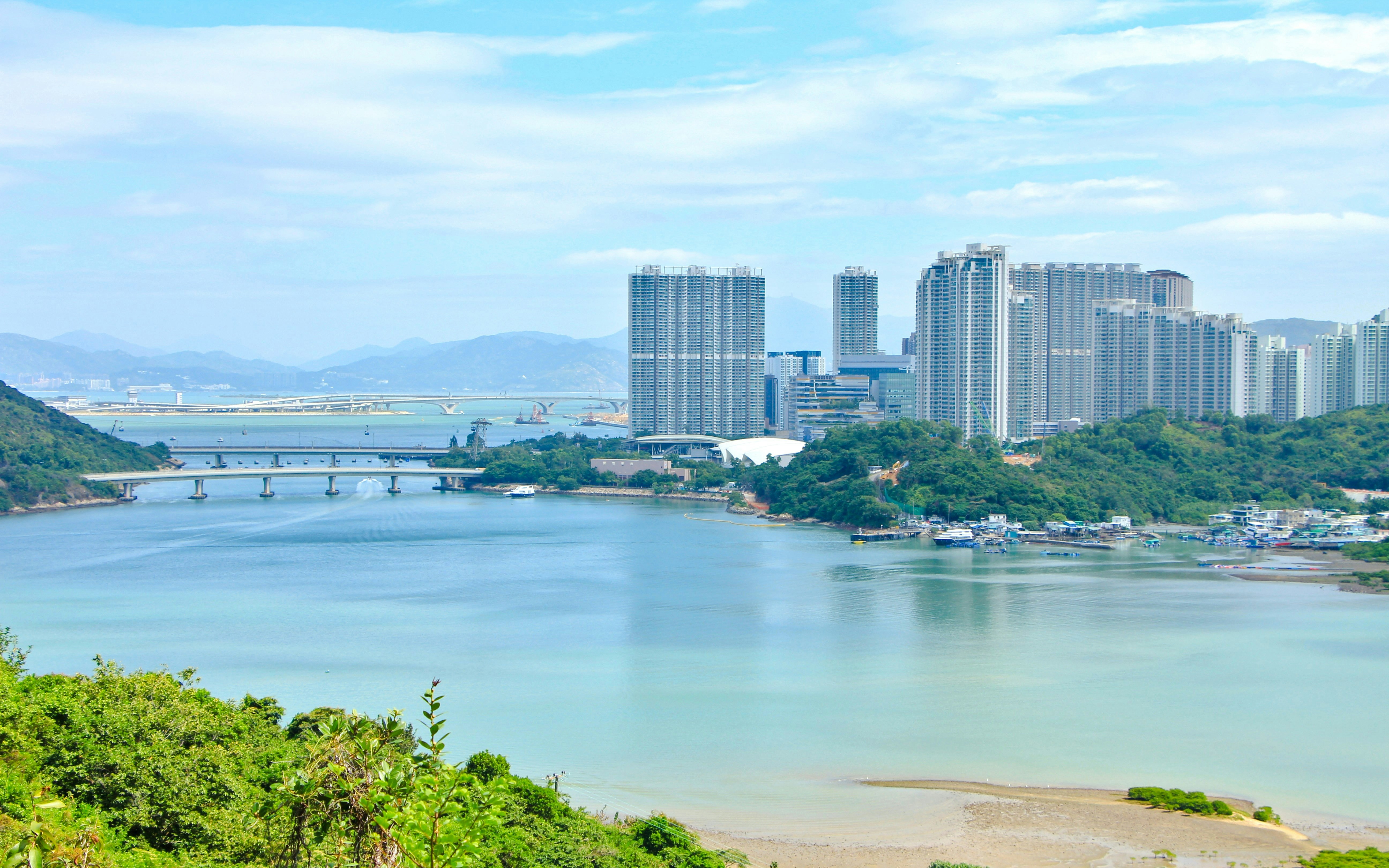 Tung Chung New Town skyline with waterfront and bridges, Hong Kong.