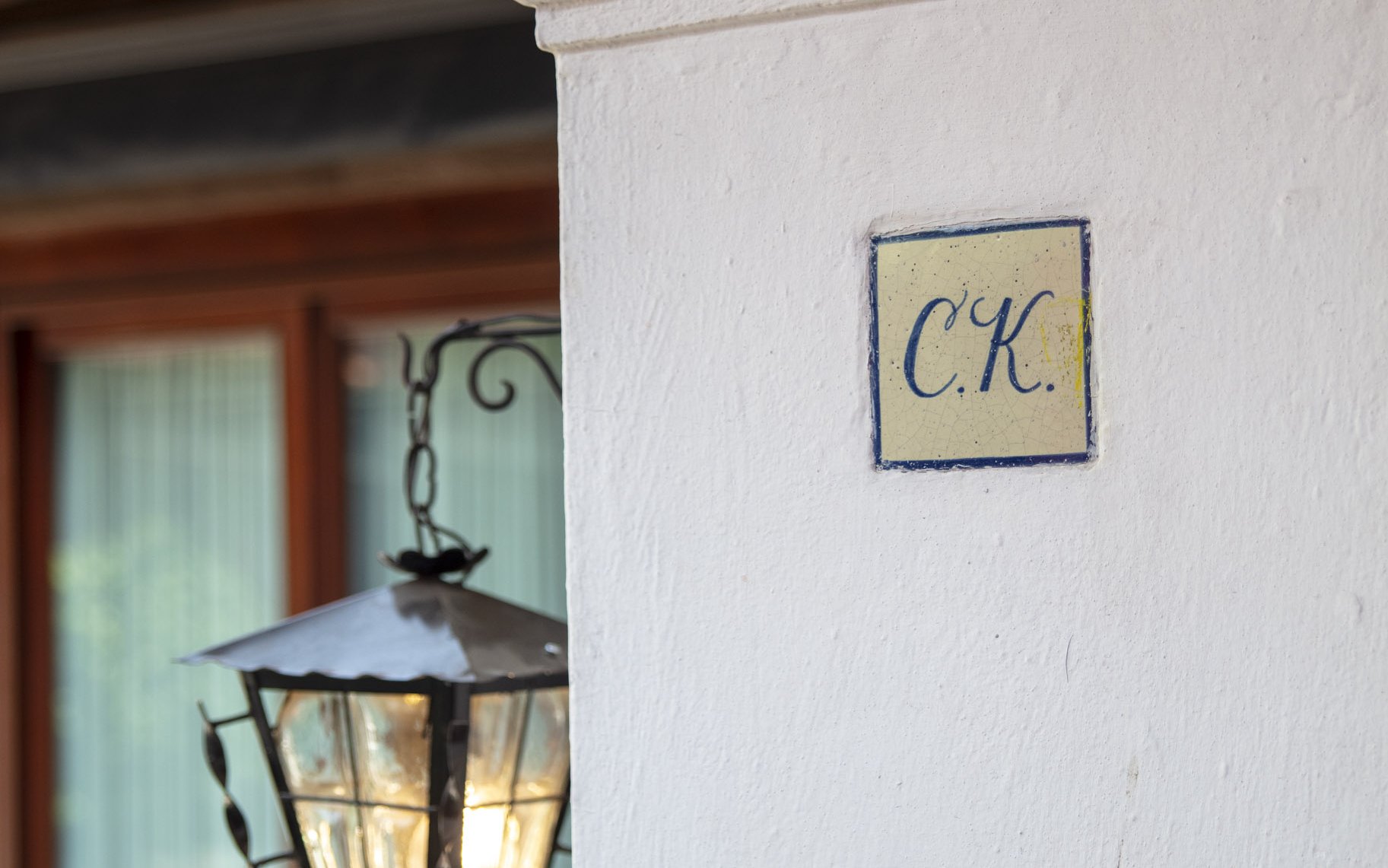 Tile with "C.K." initials on a wall at Museo Casa Kahlo, Mexico City.