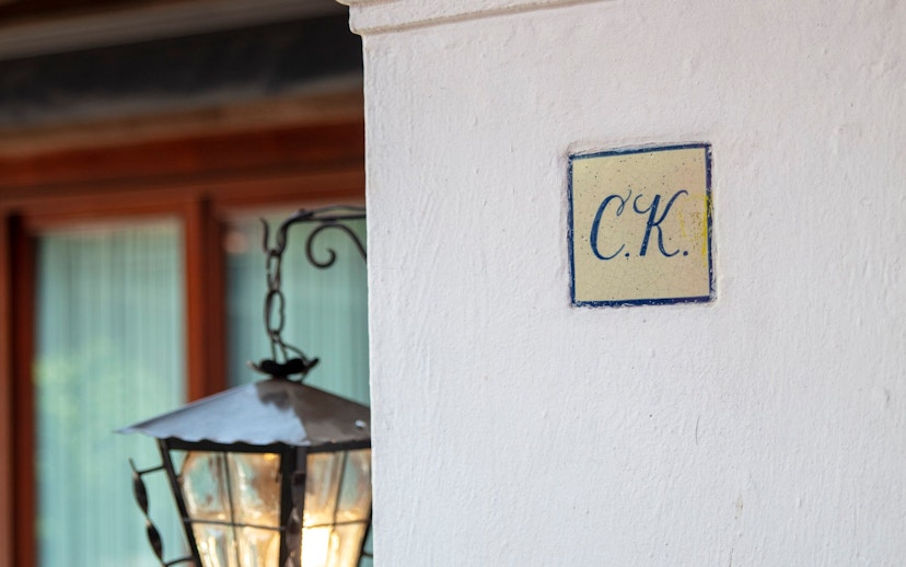 Tile with "C.K." initials on a wall at Museo Casa Kahlo, Mexico City.