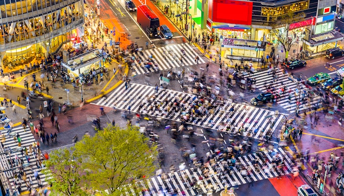 Aerial view of the bustling streets Shibuya Crossing at evening