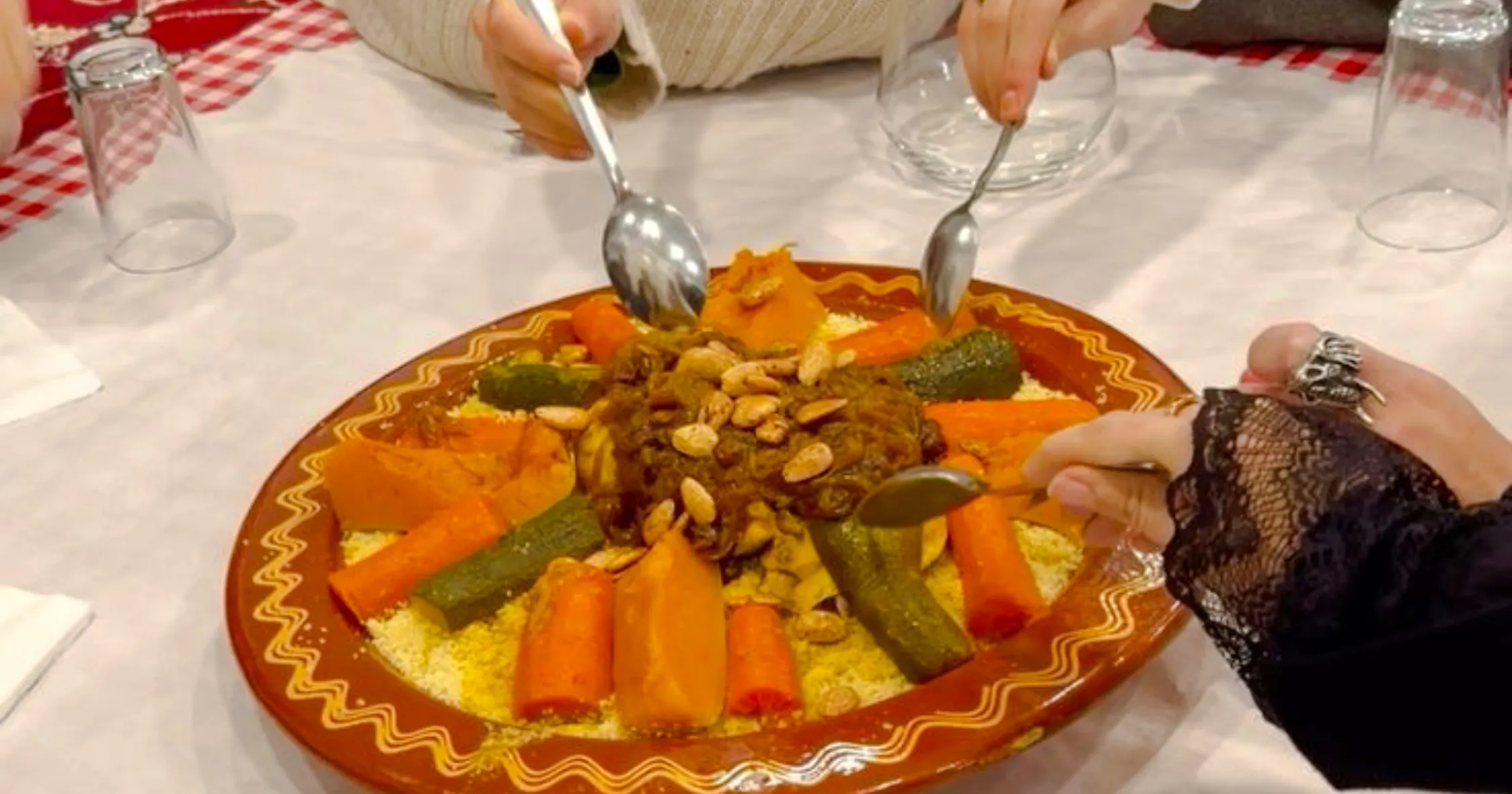 Couscous dish with vegetables and almonds at a workshop in Ben Guerir, Marrakesh.