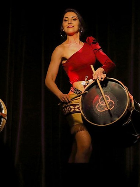 Dancers with drums performing at Michelangelo Tango Show.