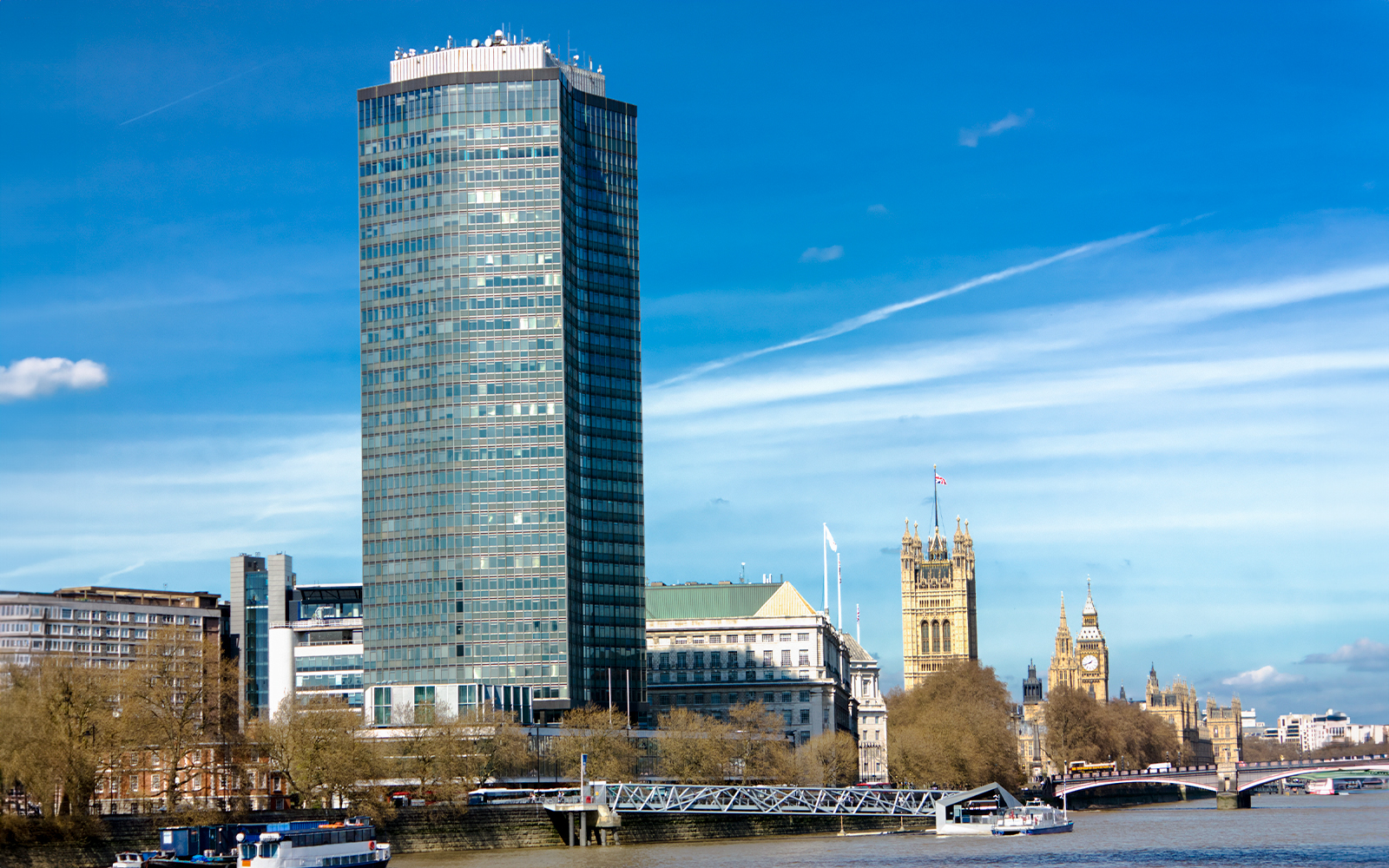 Millbank Tower and River Thames with Westminster in the background, London.