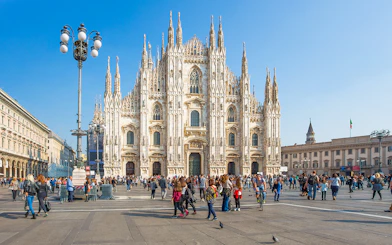 Crowd in front of the Duomo di Milano in Milan, Italy.