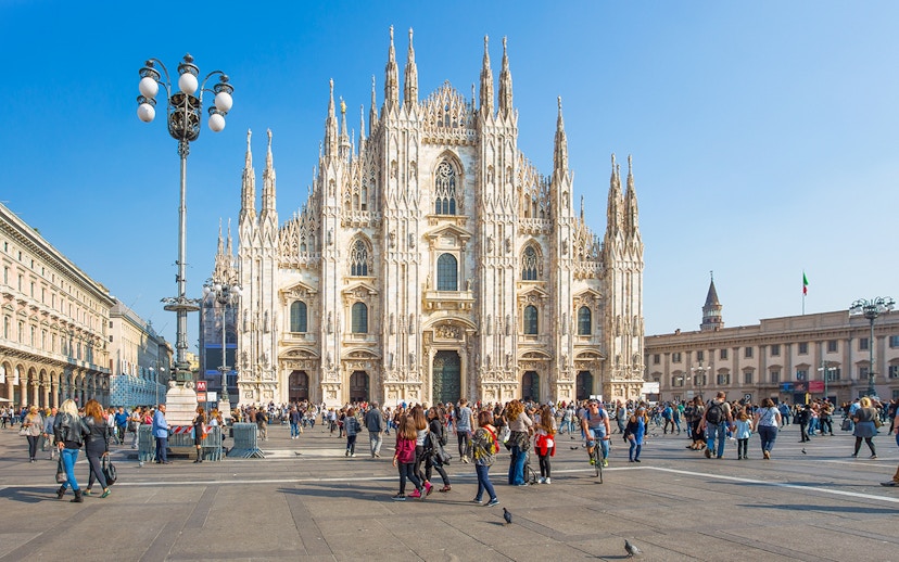 Crowd in front of the Duomo di Milano in Milan, Italy.