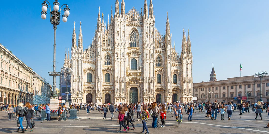 Crowd in front of the Duomo di Milano in Milan, Italy.