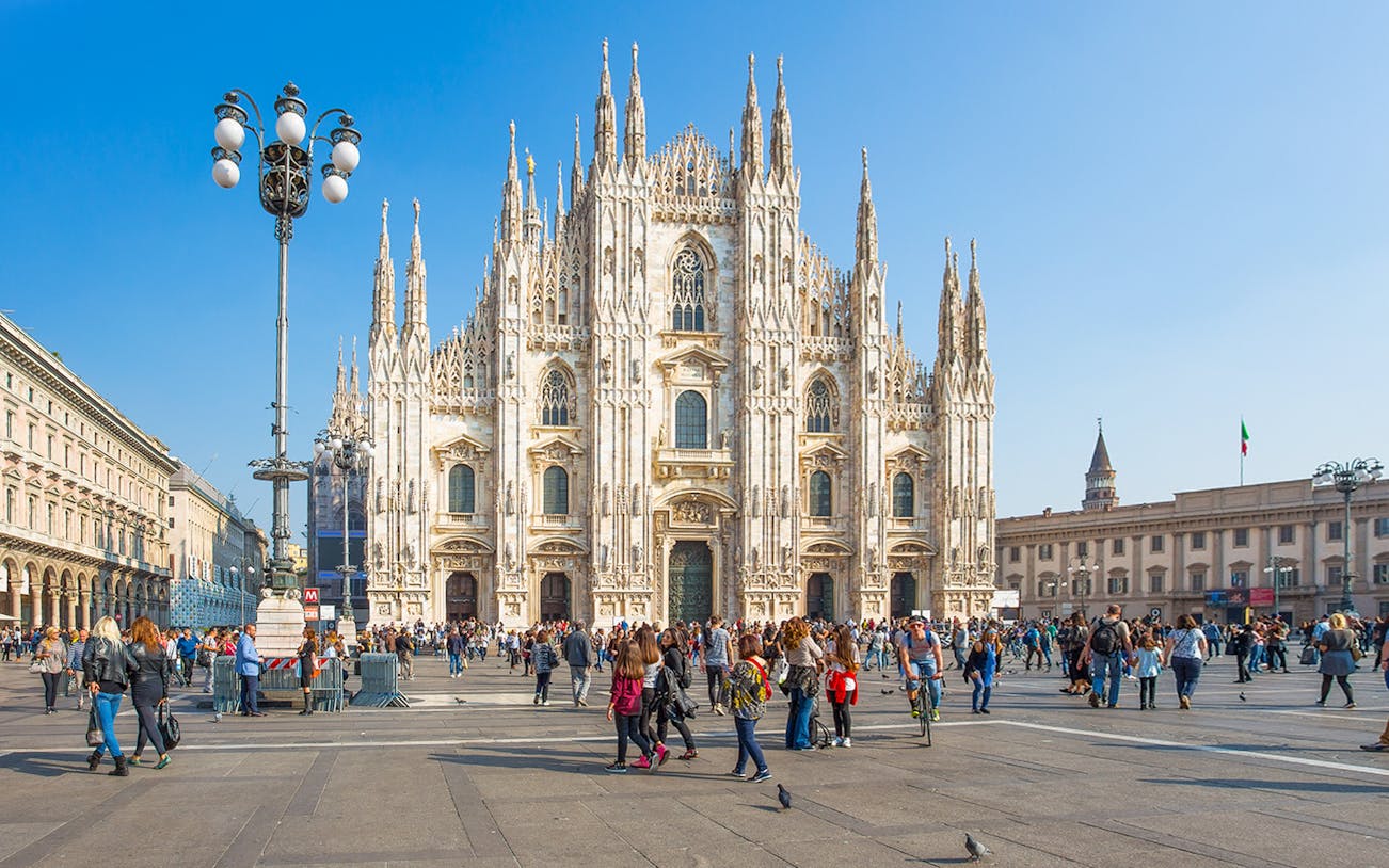 Crowd in front of the Duomo di Milano in Milan, Italy.