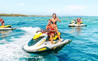 Jet skiing on the blue waters of Cannes, French Riviera, France.