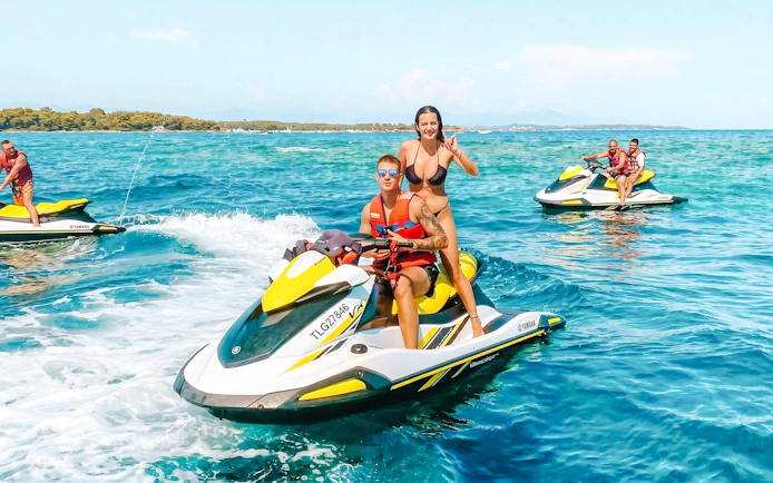 Jet skiing on the blue waters of Cannes, French Riviera, France.