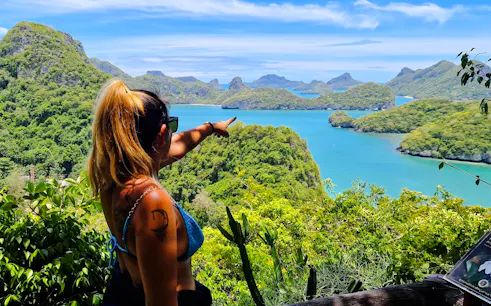 Person pointing at Ang Thong National Marine Park islands, Koh Samui.