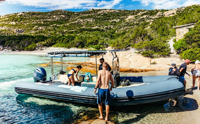 Tourists boarding a RIB boat at La Maddalena Archipelago, Italy.
